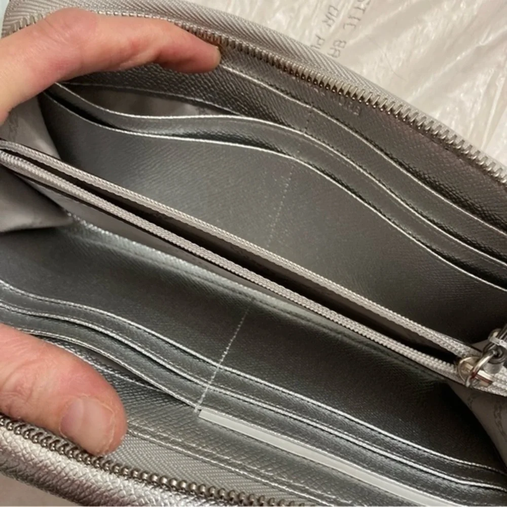 Michael Kors silver clutch bag